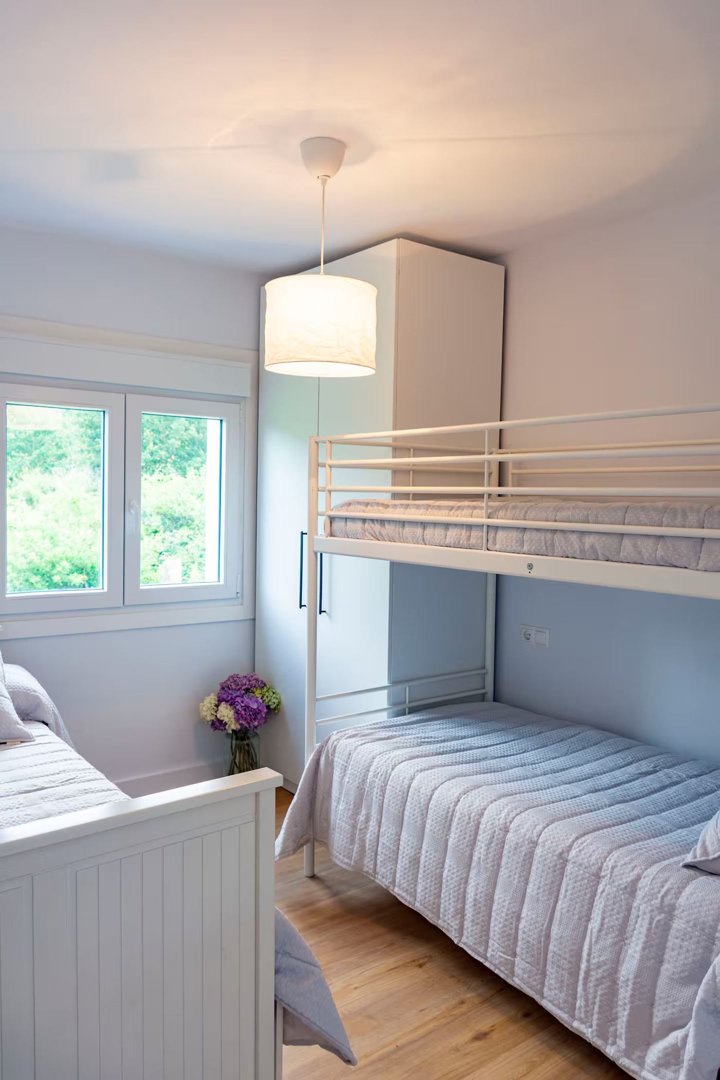 Habitación triple literas