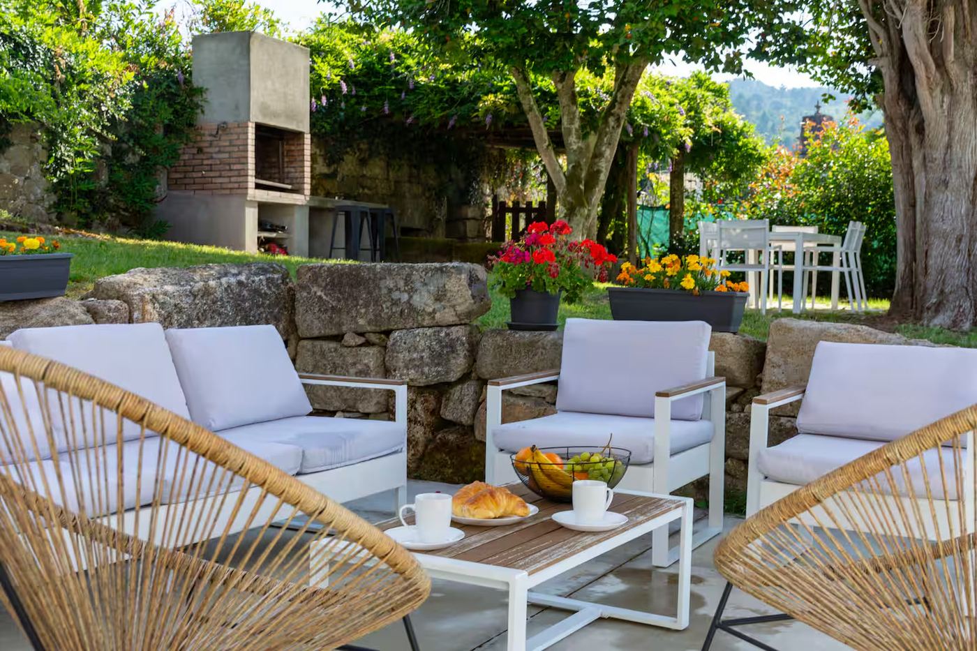 Zona exterior con barbacoa y lounge